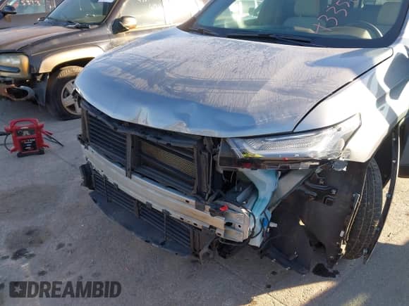 2023 Chevrolet Traverse LS z VIN 1GNERFKW1PJ129120, wystawiony jako IAAI lot #43356431 z przebiegiem 196 853 mil mil oraz . Historia ofert i sprzedaży dostępna na DreamBid. Obrazek 6.
