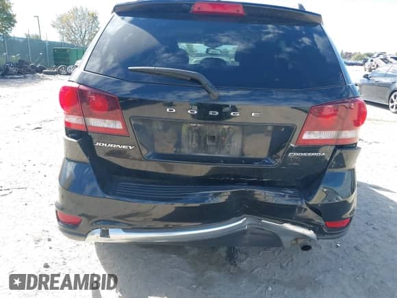 2015 Dodge Journey Crossroad with VIN 3C4PDCGB0FT547213, listed as a IAAI auction lot 43426178 with 99,999 mi miles and . Bid and sale history available at DreamBid. Image 6.