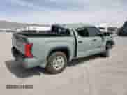 2025 Toyota Tundra SR with VIN 5TFLA5DB4SX257935, listed as a Copart auction lot 57320765 with 6,384 mi miles and Salvage title. Bid and sale history available at DreamBid. Image 3.
