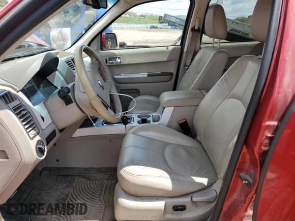 2008 Mercury Mariner Premier with VIN 4M2CU97188KJ38500, listed as a Copart auction lot 56255015 with 171,811 mi miles and Salvage title. Bid and sale history available at DreamBid. Image 7.