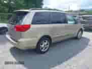 2004 Toyota Sienna XLE z VIN 5TDBA22C84S017737, wystawiony jako IAAI lot #42777025 z przebiegiem 174 665 mil mil oraz . Historia ofert i sprzedaży dostępna na DreamBid. Obrazek 4.