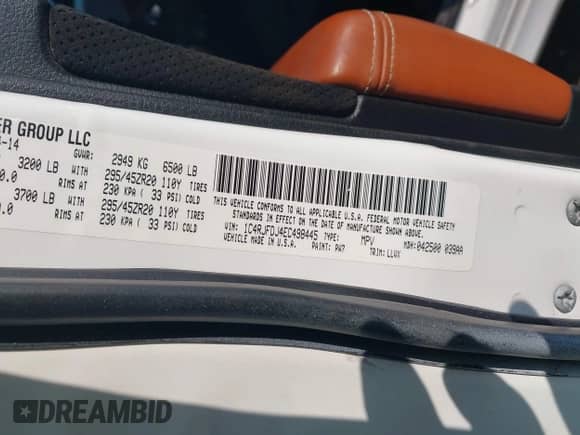 2014 Jeep Grand Cherokee SRT-8 z VIN 1C4RJFDJ4EC498445, wystawiony jako IAAI lot #42817548 z przebiegiem 115 436 mil mil oraz . Historia ofert i sprzedaży dostępna na DreamBid. Obrazek 9.