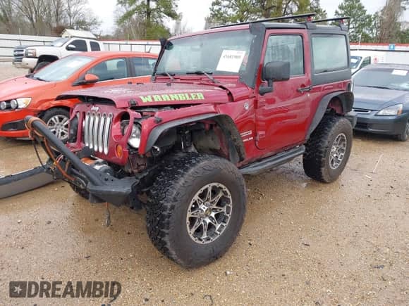2013 Jeep Wrangler Sport with VIN 1C4AJWAG0DL589698, listed as a IAAI auction lot 41681909 with 80,241 mi miles and . Bid and sale history available at DreamBid. Image 2.