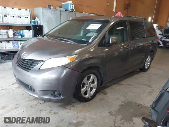 2014 Toyota Sienna LE AAS with VIN 5TDKK3DC8ES487963, listed as a IAAI auction lot 43192797 with 229,003 mi miles and . Bid and sale history available at DreamBid. Image 2.