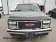 1992 GMC Sierra 1500 z VIN 2GTEK19K1N1537823, wystawiony jako Copart lot #74952004 z przebiegiem 147 810 mil mil oraz Szkoda całkowita • Salvage title. Historia ofert i sprzedaży dostępna na DreamBid. Obrazek 5.