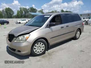2007 Honda Odyssey LX с VIN 5FNRL38237B117704, выставлен на аукционе Copart как лот 66512485 с пробегом 211 716 миль миль и Списание • Salvage title. История ставок и продаж доступна на DreamBid. Изображение 1.