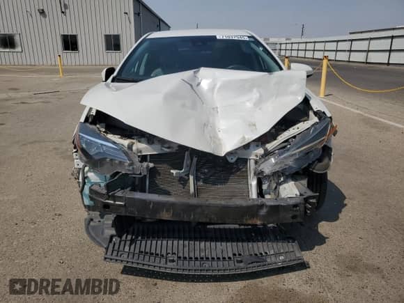 2019 Toyota Corolla LE with VIN 5YFBURHE9KP938993, listed as a Copart auction lot 71037945 with 71,852 mi miles and Salvage title. Bid and sale history available at DreamBid. Image 5.