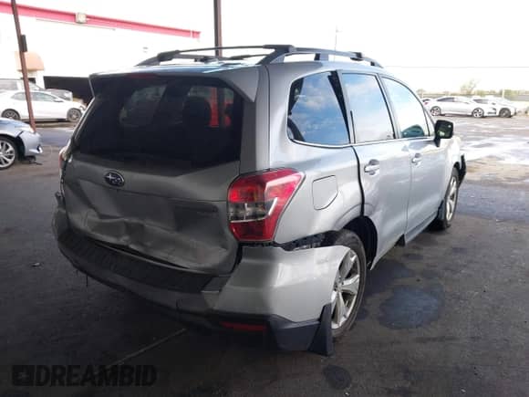 2014 Subaru Forester Limited with VIN JF2SJAJC4EH512424, listed as a IAAI auction lot 43364205 with 162,665 mi miles and . Bid and sale history available at DreamBid. Image 4.