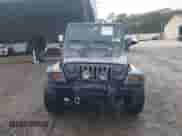 2002 Jeep Wrangler Sport z VIN 1J4FA49S02P708112, wystawiony jako IAAI lot #43374001 z przebiegiem 252 386 mil mil oraz . Historia ofert i sprzedaży dostępna na DreamBid. Obrazek 12.