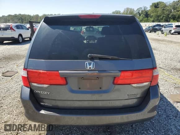 2010 Honda Odyssey LX с VIN 5FNRL3H28AB062710, выставлен на аукционе Copart как лот 71060715 с пробегом 240 460 миль миль и Списание • Salvage title. История ставок и продаж доступна на DreamBid. Изображение 6.