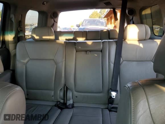 2010 Honda Pilot Touring with VIN 5FNYF4H87AB038749, listed as a Copart auction lot 69882305 with 141,496 mi miles and Salvage title. Bid and sale history available at DreamBid. Image 10.