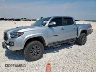 2023 Toyota Tacoma SR5 z VIN 3TMCZ5AN6PM590478, wystawiony jako Copart lot #71857305 z przebiegiem 26 216 mil mil oraz Szkoda całkowita • Salvage title. Historia ofert i sprzedaży dostępna na DreamBid. Obrazek 1.