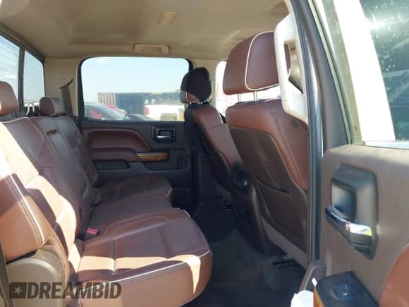 2015 Chevrolet Silverado 1500 High Country z VIN 3GCPCTECXFG468297, wystawiony jako IAAI lot #42959624 z przebiegiem 154 146 mil mil oraz . Historia ofert i sprzedaży dostępna na DreamBid. Obrazek 8.