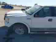 2006 Ford F-150 XLT with VIN 1FTPW14V06FA77207, listed as a IAAI auction lot 43320040 with 202,001 mi miles and . Bid and sale history available at DreamBid. Image 12.