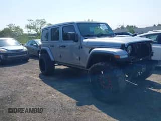 2021 Jeep Wrangler Unlimited Sahara High Altitude with VIN 1C4HJXENXMW670526, listed as a IAAI auction lot 42868629 with 26,407 mi miles and . Bid and sale history available at DreamBid. Image 1.