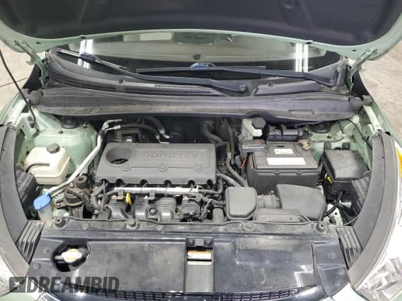 2011 Hyundai Tucson GLS with VIN KM8JU3ACXBU225908, listed as a Copart auction lot 71079005 with 114,646 mi miles and Salvage title. Bid and sale history available at DreamBid. Image 12.