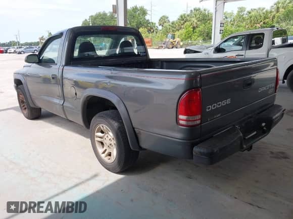 2003 Dodge Dakota с VIN 1D7FL16XX3S296008, выставлен на аукционе IAAI как лот 42393154 с пробегом 196 734 миль миль и . История ставок и продаж доступна на DreamBid. Изображение 3.