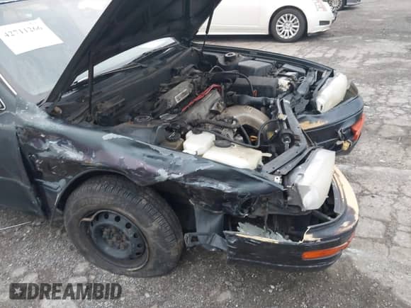 1993 Toyota Camry LE z VIN 4T1SK12E2PU176189, wystawiony jako IAAI lot #42711266 z przebiegiem 141 263 mil mil oraz . Historia ofert i sprzedaży dostępna na DreamBid. Obrazek 12.