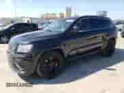 2012 Jeep Grand Cherokee SRT-8 z VIN 1C4RJFDJ7CC211421, wystawiony jako Copart lot #55883505 z przebiegiem 96 877 mil mil oraz Szkoda całkowita • Salvage title. Historia ofert i sprzedaży dostępna na DreamBid. Obrazek 1.