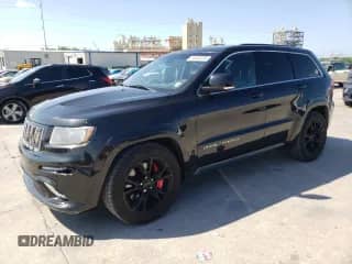 2012 Jeep Grand Cherokee SRT-8 z VIN 1C4RJFDJ7CC211421, wystawiony jako Copart lot #55883505 z przebiegiem 96 877 mil mil oraz Szkoda całkowita • Salvage title. Historia ofert i sprzedaży dostępna na DreamBid. Obrazek 1.