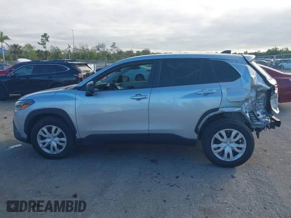 2022 Toyota Corolla Cross L with VIN 7MUAAAAG6NV010688, listed as a IAAI auction lot 41212520 with 50,075 mi miles and . Bid and sale history available at DreamBid. Image 15.