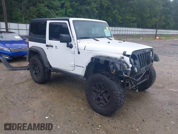 2015 Jeep Wrangler Sport with VIN 1C4AJWAG1FL593777, listed as a IAAI auction lot 42952137 with 99,393 mi miles and . Bid and sale history available at DreamBid. Image 1.
