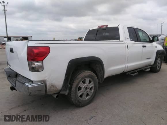 2007 Toyota Tundra SR5 z VIN 5TFST54127X001992, wystawiony jako IAAI lot #41510922 z przebiegiem 186 412 mil mil oraz . Historia ofert i sprzedaży dostępna na DreamBid. Obrazek 4.