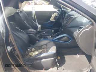 2014 Hyundai Veloster Turbo z VIN KMHTC6AEXEU203300, wystawiony jako IAAI lot #43397888 z przebiegiem 119 165 mil mil oraz . Historia ofert i sprzedaży dostępna na DreamBid. Obrazek 5.