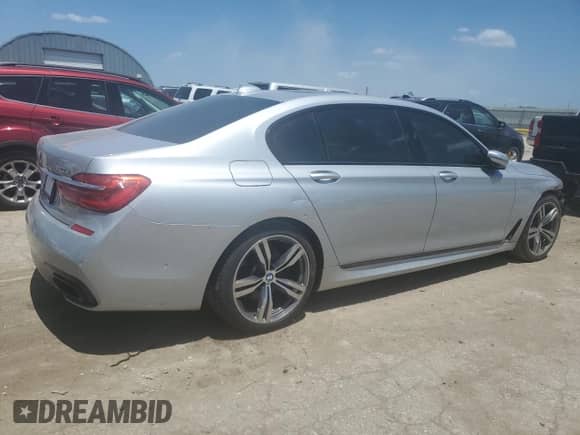 2016 BMW 7 Series 750i xDrive с VIN WBA7F2C59GG417311, выставлен на аукционе Copart как лот 61777655 с пробегом 103 374 миль миль и Списание • Salvage title. История ставок и продаж доступна на DreamBid. Изображение 3.