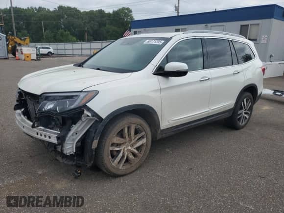 2018 Honda Pilot Touring с VIN 5FNYF6H98JB002945, выставлен на аукционе Copart как лот 68171235 с пробегом 98 223 миль миль и Списание • Salvage title. История ставок и продаж доступна на DreamBid. Изображение 1.