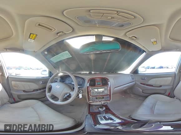 2004 Hyundai Sonata GLS z VIN KMHWF35H64A073703, wystawiony jako Copart lot #74333504 z przebiegiem 105 034 mil mil oraz Szkoda całkowita • Salvage title. Historia ofert i sprzedaży dostępna na DreamBid. Obrazek 13.