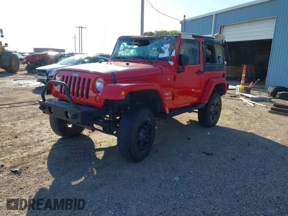 2012 Jeep Wrangler Arctic with VIN 1C4AJWBG7CL195807, listed as a IAAI auction lot 40587832 with 14,330 mi miles and . Bid and sale history available at DreamBid. Image 2.