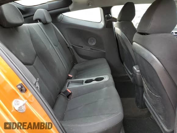 2016 Hyundai Veloster z VIN KMHTC6ADXGU263958, wystawiony jako Copart lot #82074745 z przebiegiem 143 210 mil mil oraz Szkoda całkowita • Salvage title. Historia ofert i sprzedaży dostępna na DreamBid. Obrazek 10.