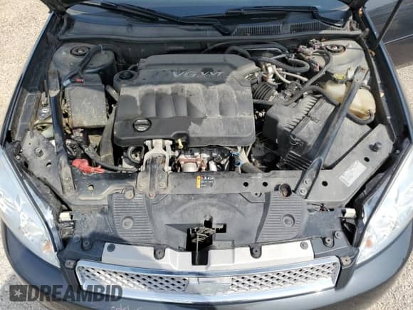2014 Chevrolet Impala LT z VIN 2G1WB5E32E1152855, wystawiony jako Copart lot #69013875 z przebiegiem 101 915 mil mil oraz Szkoda całkowita • Salvage title. Historia ofert i sprzedaży dostępna na DreamBid. Obrazek 11.