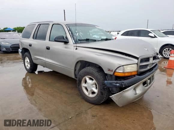 2000 Dodge Durango с VIN 1B4HR28Y6YF133558, выставлен на аукционе Copart как лот 60477285 с пробегом 288 343 миль миль и Списание • Salvage title. История ставок и продаж доступна на DreamBid. Изображение 4.