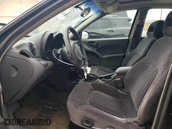 2002 Pontiac Grand Am GT z VIN 1G2NW52E32M642965, wystawiony jako Copart lot #46258865 z przebiegiem 89 026 mil mil oraz Szkoda całkowita • Salvage title. Historia ofert i sprzedaży dostępna na DreamBid. Obrazek 7.