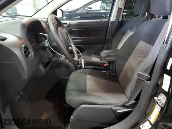 2014 Jeep Compass Sport with VIN 1C4NJDBB9ED842554, listed as a Copart auction lot 69468485 with 124,308 mi miles and Salvage title. Bid and sale history available at DreamBid. Image 7.