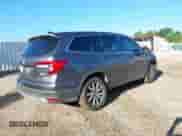 2020 Honda Pilot EX-L with VIN 5FNYF5H58LB009744, listed as a IAAI auction lot 42723863 with 144,337 mi miles and . Bid and sale history available at DreamBid. Image 4.