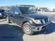 2011 Nissan Frontier Pro-4X with VIN 1N6AD0EV7BC440969, listed as a IAAI auction lot 42968301 with 165,210 mi miles and . Bid and sale history available at DreamBid. Image 1.