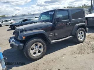 2014 Jeep Wrangler Sahara z VIN 1C4AJWBG4EL196867, wystawiony jako Copart lot #71590205 z przebiegiem 121 968 mil mil oraz Szkoda całkowita • Salvage title. Historia ofert i sprzedaży dostępna na DreamBid. Obrazek 1.