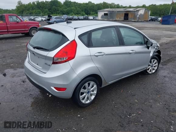 2012 Ford Fiesta SE with VIN 3FADP4EJ9CM216328, listed as a IAAI auction lot 42354681 with Not provided miles and . Bid and sale history available at DreamBid. Image 4.