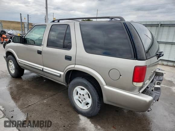 2001 Chevrolet Blazer LT с VIN 1GNDT13W812212561, выставлен на аукционе Copart как лот 85734445 с пробегом 202 742 миль миль и Списание • Salvage title. История ставок и продаж доступна на DreamBid. Изображение 2.