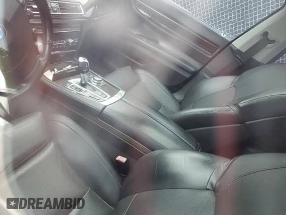 2011 BMW 7 Series 750i xDrive with VIN WBAKC6C55BC394717, listed as a Copart auction lot 59570605 with Not provided miles and Salvage title. Bid and sale history available at DreamBid. Image 8.