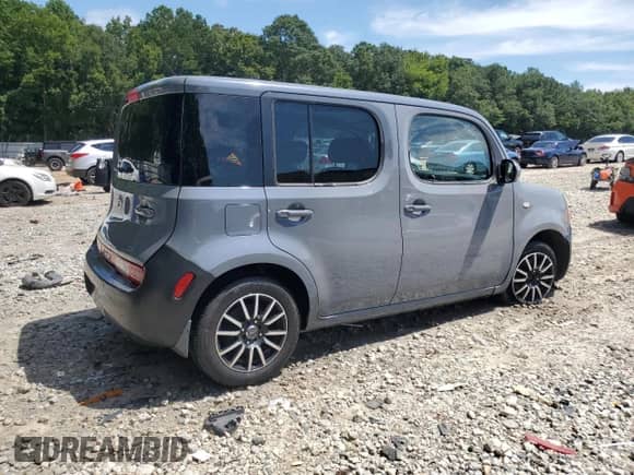 2013 Nissan Cube S z VIN JN8AZ2KR7DT302735, wystawiony jako Copart lot #69670105 z przebiegiem Nie podano mil oraz Szkoda całkowita • Salvage title. Historia ofert i sprzedaży dostępna na DreamBid. Obrazek 3.