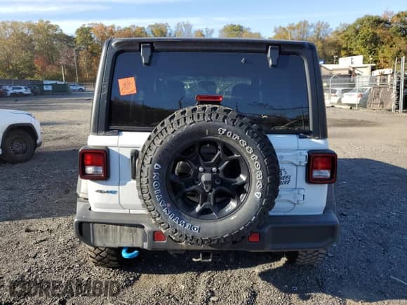 2023 Jeep Wrangler with VIN 1C4JJXN66PW628482, listed as a Copart auction lot 90037175 with 47,416 mi miles and Non repairable. Bid and sale history available at DreamBid. Image 6.
