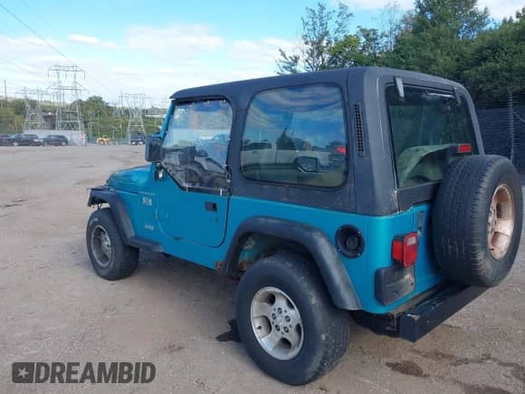 1997 Jeep Wrangler SE z VIN 1J4FY29P7VP447481, wystawiony jako IAAI lot #43438550 z przebiegiem 190 965 mil mil oraz . Historia ofert i sprzedaży dostępna na DreamBid. Obrazek 3.