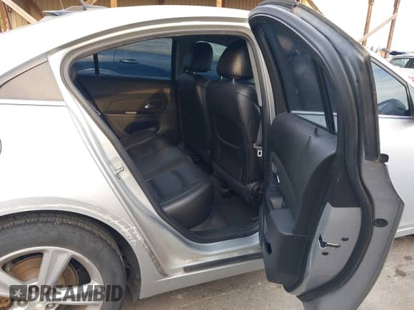 2013 Chevrolet Cruze 2LT z VIN 1G1PE5SB7D7241846, wystawiony jako IAAI lot #43061145 z przebiegiem 159 638 mil mil oraz . Historia ofert i sprzedaży dostępna na DreamBid. Obrazek 8.