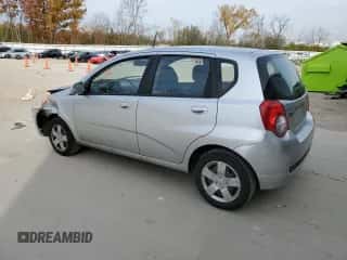 2011 Chevrolet Aveo 1LT z VIN KL1TD6DE3BB205725, wystawiony jako Copart lot #77129904 z przebiegiem 132 792 mil mil oraz Nie do naprawy • Non repairable. Historia ofert i sprzedaży dostępna na DreamBid. Obrazek 2.