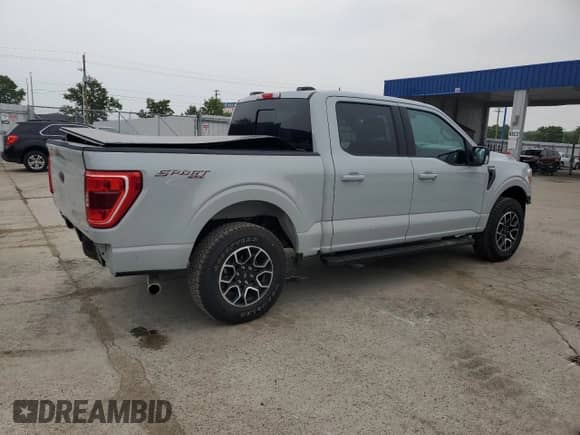 2023 Ford F-150 XL с VIN 1FTEW1EP7PFA79934, выставлен на аукционе Copart как лот 60852635 с пробегом 11 642 миль миль и Списание • Salvage title. История ставок и продаж доступна на DreamBid. Изображение 3.
