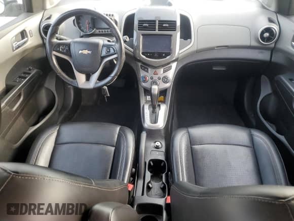 2015 Chevrolet Sonic LTZ with VIN 1G1JE6SB4F4208996, listed as a Copart auction lot 65555385 with 76,714 mi miles and Salvage title. Bid and sale history available at DreamBid. Image 8.